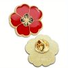 A red poppy lapel pin with intricate petal detailing, symbolizing pride. The pin can be worn on a lapel, hat, tie, or as a brooch. It represents remembrance and support, often associated with veterans.