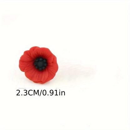 A red poppy lapel pin with intricate petal detailing, symbolizing pride. The pin can be worn on a lapel, hat, tie, or as a brooch. It represents remembrance and support, often associated with veterans.
