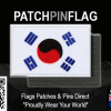 A tactical patch of the South Korean flag, featuring a removable design. The flag displays a red and blue yin-yang symbol in the center, surrounded by four black trigrams on a white background.