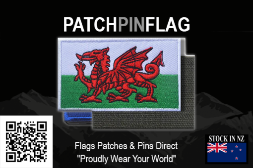 A rectangular patch featuring the Welsh flag design, with a red dragon on a white and green background, embroidered for tactical use. It has a hook and loop backing for easy attachment.